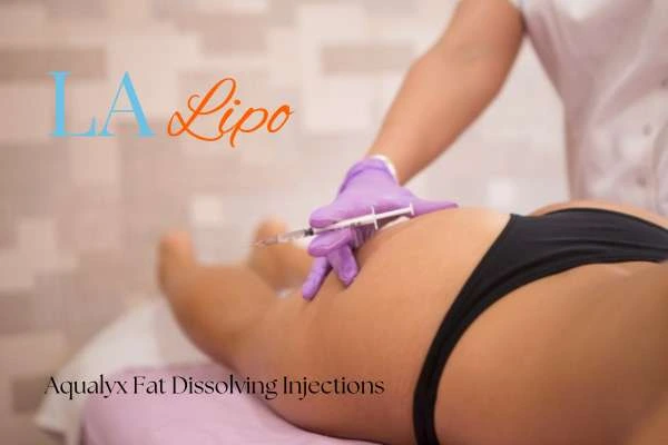 Woman having fat dissolving injections Blackwall on thighs